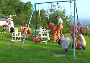 Lingerie-wearing beauty sucks cock outdoors