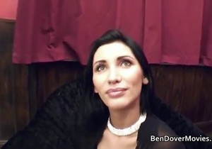 Dark-haired chick riding a fat cock for the camera