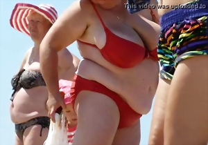 BBW mature in red bikinis spotted on the beach